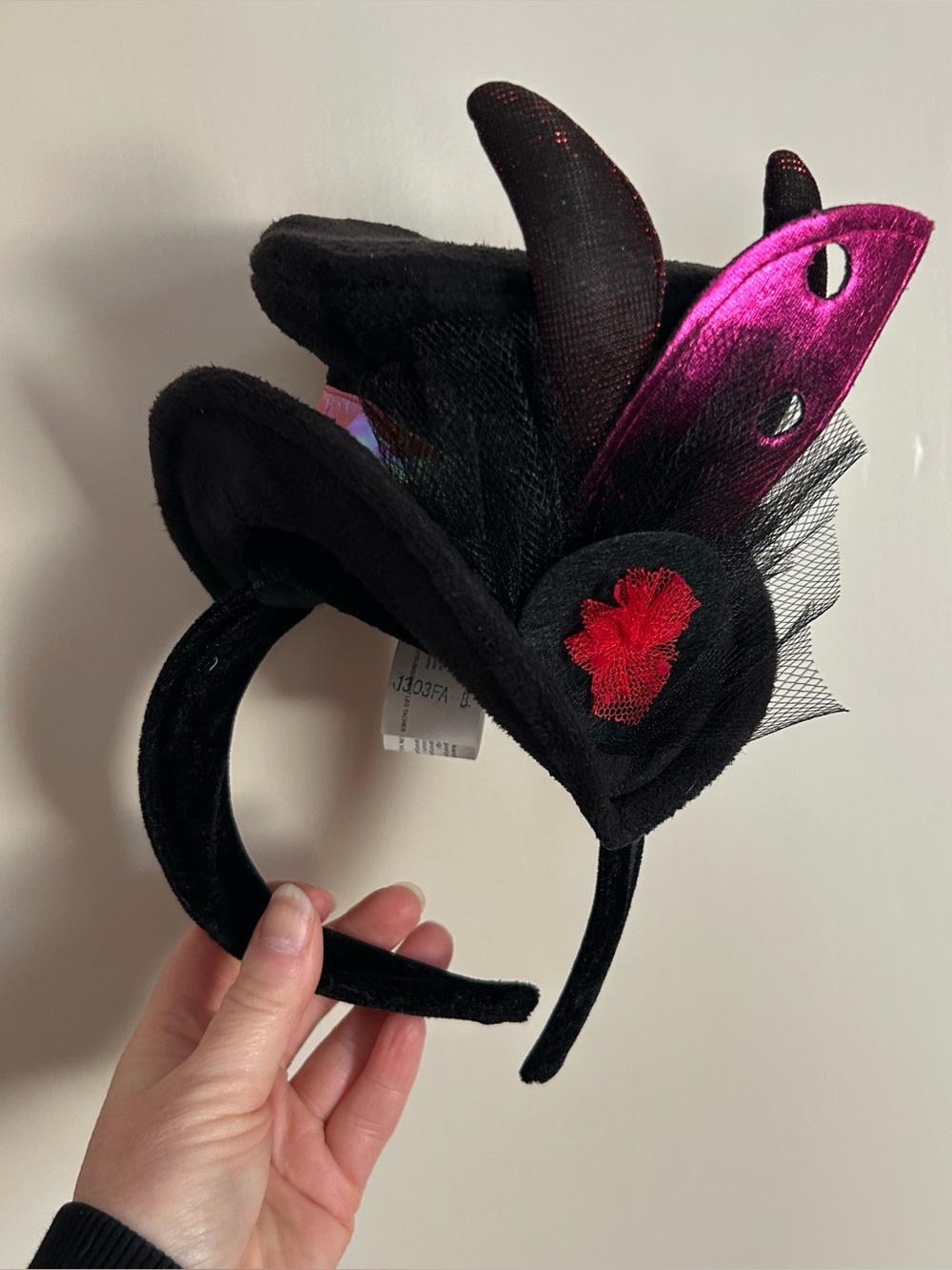 Cirque Du Soleil Black Velvet Mini Top Hat Headband with Fuchsia Accent.